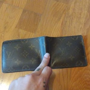 Louis Vuitton mens wallet, engraved for ex now married, would like to sell fast.
